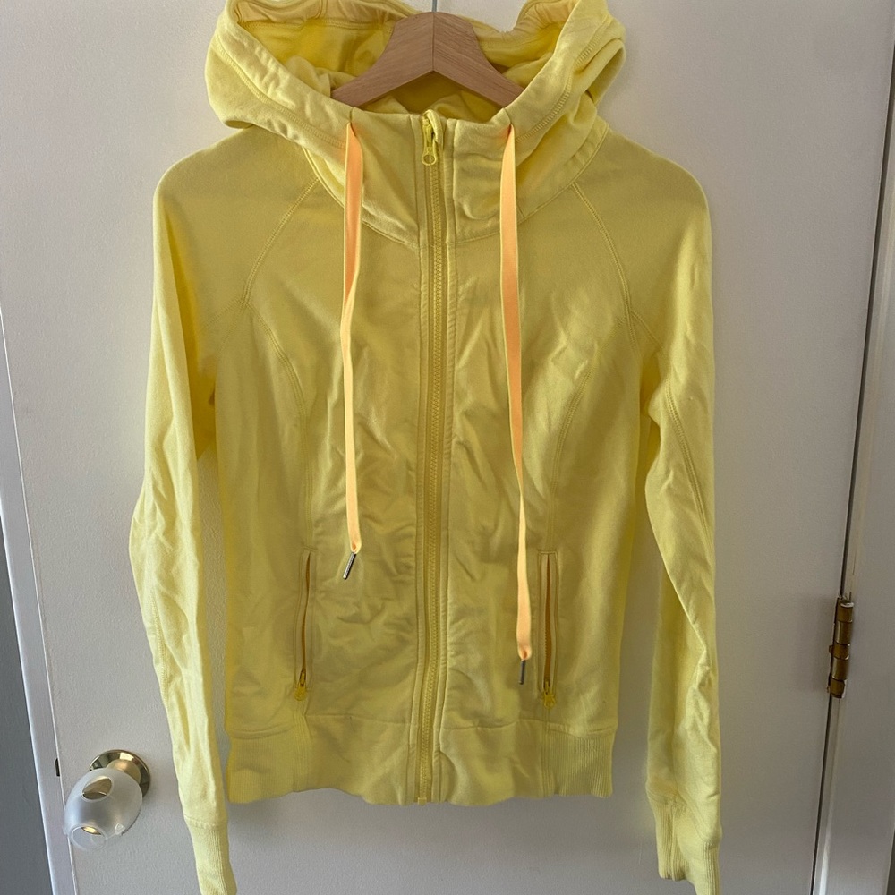 Lululemon size 6 zip up jacket with hood. Lightly worn.